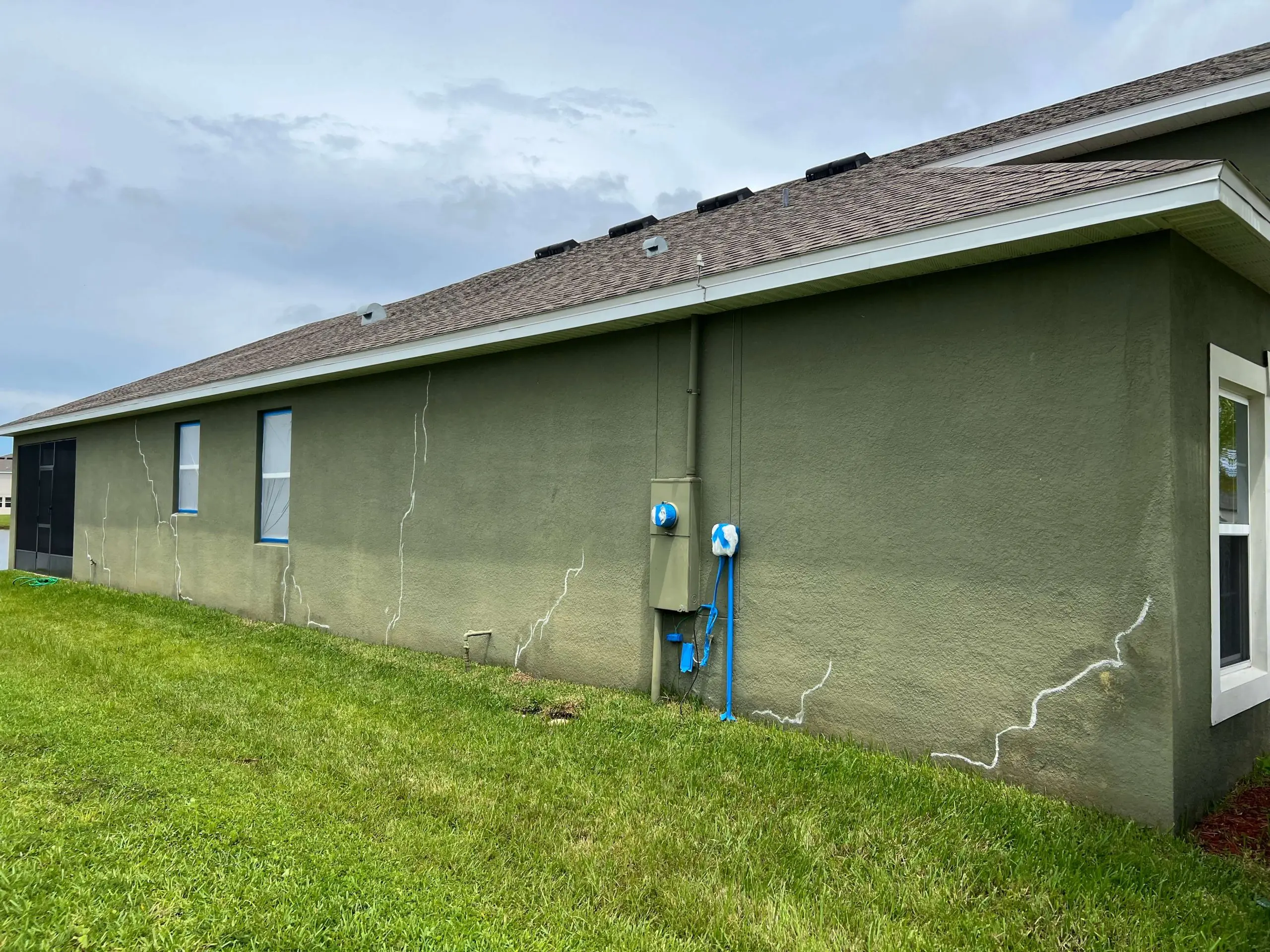 stucco repair home before
