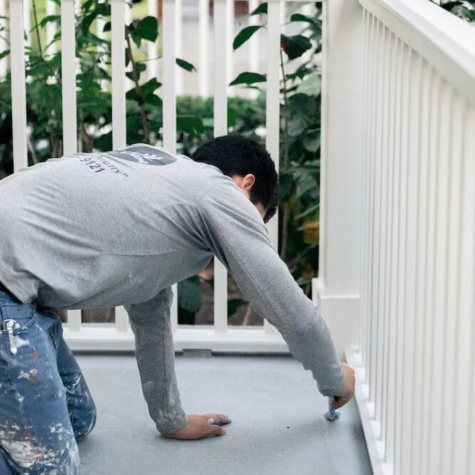 smith-and-co-painting-orlando-fl-best-painters smith & co painting painter painting the front porch of an orlando area home