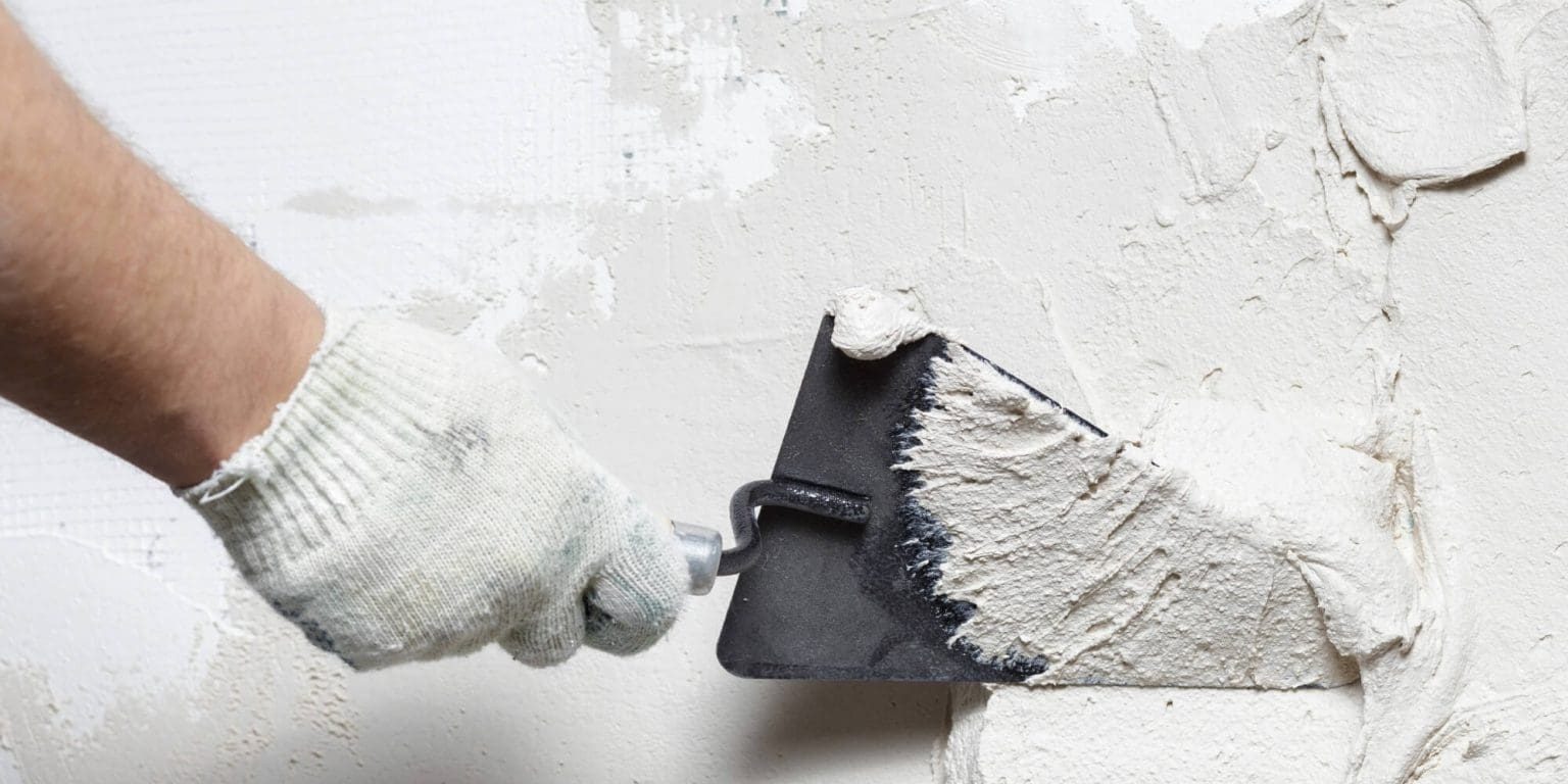Smith & CO stucco repairing a interior house